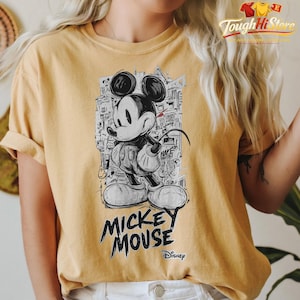 May include: A set of three ceramic mugs with a speckled, matte finish in cream, light grey, and dark grey. Each mug has a simple, minimalist design, ideal for coffee or tea.