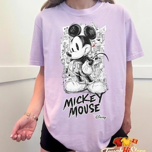 May include: A set of three ceramic mugs with a speckled, matte finish in cream, light grey, and dark grey. Each mug has a simple, minimalist design, suitable for coffee or tea.