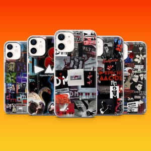 May include: A white ceramic mug with a black handle and the text "But First, Coffee" in a bold, black font. The mug is set against a blurred background. The mug appears to be approximately 10 cm tall.