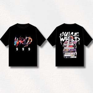 May include: Black t-shirts with graphic designs. One shirt features the word "WRLD" in a colorful, graffiti-style font with the numbers "999" below. The other shirt displays "JUICE WRLD" in white, with an image of a person sitting on a stack of tapes.