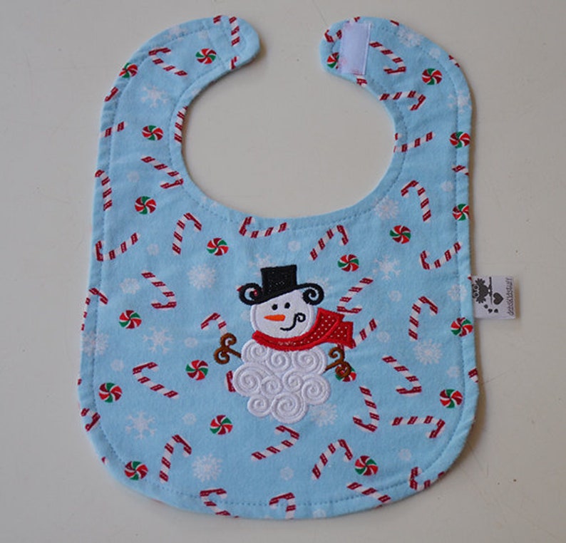 Snowman Dress Up Bib Blue Flannel Fabric Candy Canes Peppermint Christmas Toddler Baby Gift Baby Shower Flannel backing Absorable Reversible