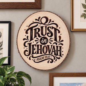 May include: A circular wood slice wall art piece featuring laser-engraved text that reads TRUST in JEHOVAH - PSALM 115:11. The natural wood grain is visible, and the edges retain the rough, dark bark texture of the original tree trunk.