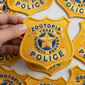 May include: A set of three ceramic vases in varying heights and shapes. The vases are glazed in a matte white finish, offering a minimalist aesthetic. The tallest vase is approximately 10 inches high.