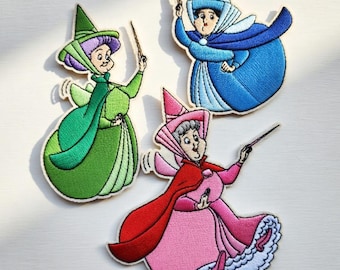Flora Fauna Merryweather Broderad lapp, Törnrosa älvor Stryk-på lapp, Disney älvgudmödrar applikation, jacka ryggsäck gåva