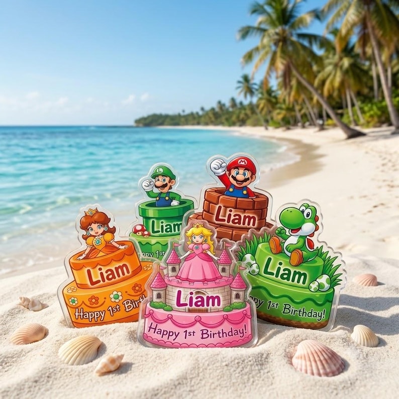 May include: Five acrylic cake toppers featuring Super Mario characters including Princess Daisy, Luigi, Mario, Princess Peach, and Yoshi. Each topper displays the name Liam and the text Happy 1st Birthday on colorful cake or castle designs.