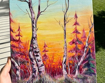 May include: An acrylic painting on canvas depicting a forest scene at sunset. The composition features two prominent birch trees in the foreground against a vibrant background of yellow, orange, and red hues, with silhouettes of pine trees.