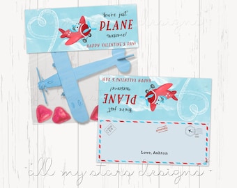 May include: A blue and red airplane with a heart-shaped trail behind it. The airplane has a message that says "You're just PLANE awesome! Happy Valentine's Day!"