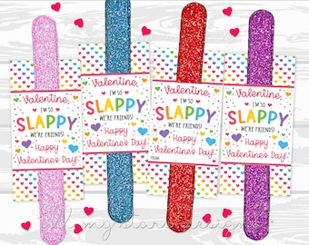 May include: Four Valentine's Day cards with glitter sticks. Each card has a colorful heart pattern and says "Valentine, I'm so Slappy, We're Friends! Happy Valentine's Day!"