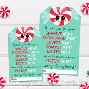 May include: A mint green Christmas gift tag with a red and white candy cane design. The tag says "Thank you for your involve-mint, encourage-mint, invest-mint, commit-mint, excite-mint. Here's a little something for your enjoy-mint. Merry Christmas!"
