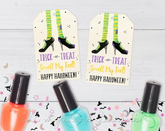 May include: Two printable Halloween gift tags featuring a witch's legs with green and yellow striped stockings and black shoes. The text on the tags reads "Trick-or-Treat Smell My Feet! Happy Halloween!"