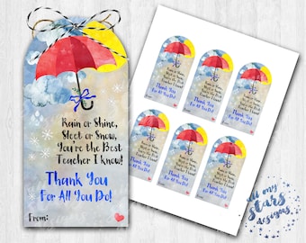 Op de afbeelding: Een printbare cadeautag voor leerkrachten met een aquarel-illustratie van een rode paraplu met een blauw lint, wolken en sneeuwvlokken. De tekst luidt "Regen of zonneschijn, hagel of sneeuw, je bent de beste leraar die ik ken! Bedankt voor alles wat je doet!"