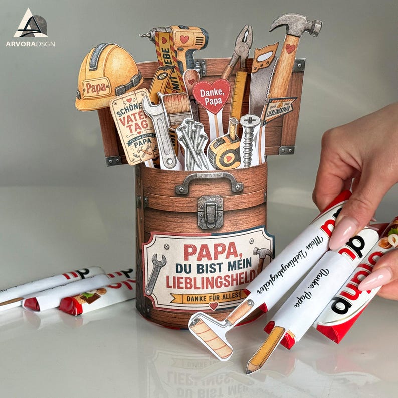 Vatertag Bastelidee mit Schokolade, Papier Werkzeugen und Danke Papa Dekoration