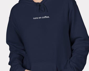 Sudadera con capucha "Corre a base de café"