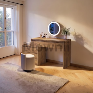 May include: A wooden vanity with a round, illuminated mirror, a small stool, and a rug. The vanity has drawers and a tabletop with beauty products. A vase of flowers sits on the right side of the vanity.
