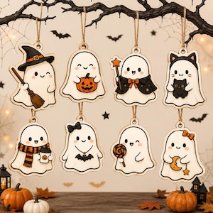 May include: A set of eight hanging wooden ornaments featuring white ghost characters with various Halloween-themed accessories including a witch hat, broom, pumpkin, wand, cat ears, scarf, coffee cup, bat necklace, lollipop, and a crescent moon.