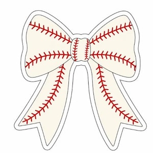 May include: A decorative bow shape featuring an off-white surface with red stitching patterns that mimic the appearance of a baseball. The design includes a central knot and two long, flowing tails, all outlined with a thin black border.