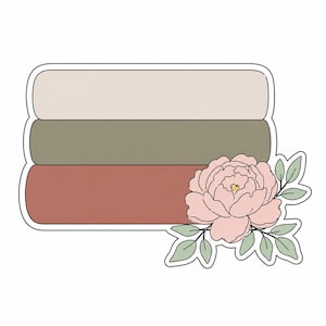 May include: A sticker featuring three stacked rectangular shapes in beige, olive green, and terracotta colors. A pink peony flower with green leaves is on the right side of the rectangles. The sticker has a white border.