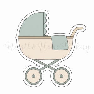 May include: A cookie cutter in the shape of a vintage baby carriage. The carriage is light beige with a light green hood and blanket. The wheels and frame are light green. The text "Hearth & Home Bakery" is in the image.