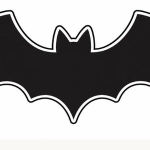 May include: A black bat silhouette with a white outline, featuring pointed ears and wide, scalloped wings. The design is symmetrical, displaying a solid black central body shape with a clean white border surrounding the entire bat figure.