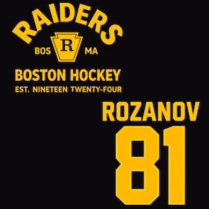 May include: Black background with yellow text reading "RAIDERS" above a crest with the letter "R". Below the crest is "BOS MA". The text "BOSTON HOCKEY EST. NINETEEN TWENTY-FOUR" is also present. The name "ROZANOV" and the number "81" are displayed in yellow.