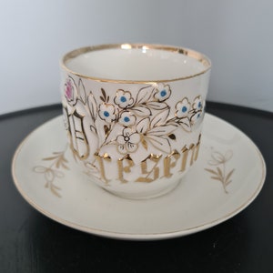 Vintage German Floral Present Teacup and Saucer
