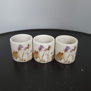 Vintage napkin rings - set of 3 - porcelain - butterflies bees flowers