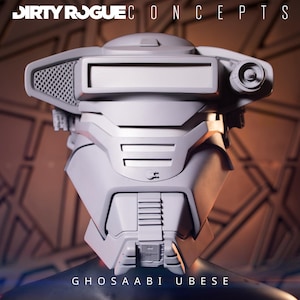 May include: A futuristic, white robotic head with a detailed design. The head features a rectangular visor, a circular eye-like component, and a textured section. The text "DIRTY ROGUE CONCEPTS" and "GHOSAABI UBERSE" are visible.