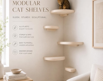 May include: Modular cat shelves mounted in a corner, featuring five beige, semi-circular platforms at varying heights. A brown tabby cat sits on the top shelf. Text on the wall reads: MODULAR CAT SHELVES, SLEEK. STURDY. SCULPTURAL. ALL-PLASTIC & EASY TO CLEAN.