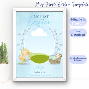 Könnte beinhalten: Ein gerahmter, hellblauer Osterdruck mit dem Text "My First Easter". Es zeigt ein Cartoon-Küken, das ein Ei hält, einen Korb mit Eiern und Platz für ein Foto. Der Text "Milo" und "Easter 2026" sind ebenfalls enthalten.