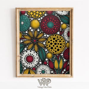 May include: A framed art print with a vibrant, abstract floral pattern. The design incorporates circular motifs in teal, yellow, red, and white, adorned with detailed dot patterns and leaf-like forms. The frame is light brown. The print is signed "Vintage Vine Prints".