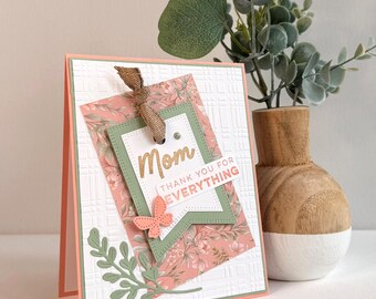 May include: A distressed wooden sign, inscribed with 'Welcome to our home' in white. The sign has a rustic appearance, ideal for a porch or hallway, and is designed with a simple, welcoming aesthetic.