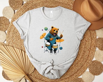 Space Bear Playing Drums Cosmic Tee, Astronaut Musician Galaxy Shirt, Retro Sci-Fi Starry Sky Graphic T-shirt