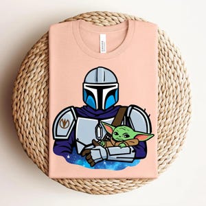 Mandalorian Grogu Shirt, Baby Yoda Star Wars Tee, Mandalorian and Grogu Graphic Shirt, Galaxy Protector Character Tee, Star Wars Fan Shirt image 7