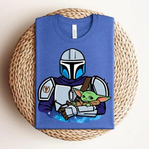 Mandalorian Grogu Shirt, Baby Yoda Star Wars Tee, Mandalorian and Grogu Graphic Shirt, Galaxy Protector Character Tee, Star Wars Fan Shirt image 10