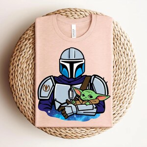 Mandalorian Grogu Shirt, Baby Yoda Star Wars Tee, Mandalorian and Grogu Graphic Shirt, Galaxy Protector Character Tee, Star Wars Fan Shirt image 3