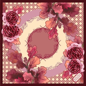 May include: A square scarf featuring a watercolor print of deep red roses and oak leaves arranged around concentric circles. The background displays a tan cane webbing pattern. The text Bliss Hill Mahjong appears in the bottom right corner.