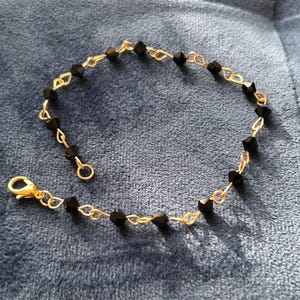 Pulsera clásica de azabache trinitense, cuentas de vidrio negro facetadas, amuleto de protección caribeño. imagen 12