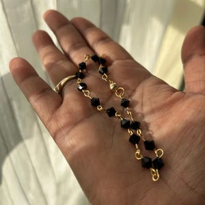 Pulsera clásica de azabache trinitense, cuentas de vidrio negro facetadas, amuleto de protección caribeño. imagen 9