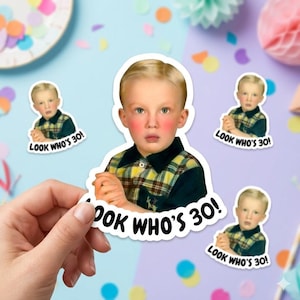May include: A collection of stickers featuring a vintage image of a young boy with rosy cheeks, wearing a plaid shirt. The stickers have the text "LOOK WHO'S 30!" in a bold, white font, perfect for a birthday celebration.