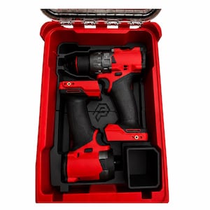 May include: A red and black cordless drill and an impact driver set housed within a custom-molded black foam insert inside a bright red hard-shell carrying case. The tools feature ergonomic black rubberized grips and red plastic housing.