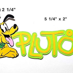 May include: A yellow Pluto character cutout, 3" x 2 1/4", with a green collar and pink tongue, next to a green and yellow cutout of the name "PLUTO", 5 1/4" x 2".