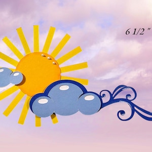 May include: A yellow sun with rays and three white dots, behind a blue cloud with three white circles. A blue swirl design is on the right side of the image. The text "6 1/2" is in the upper right corner of the image.
