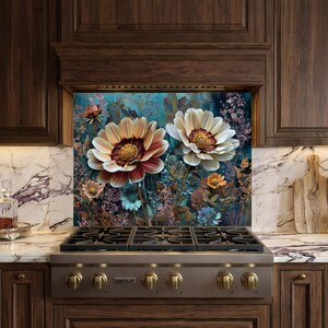 May include: A floral kitchen splashback featuring two large flowers with cream and rust petals and a yellow centre. The background is a mix of blue, green, and purple hues, with other flowers and foliage.