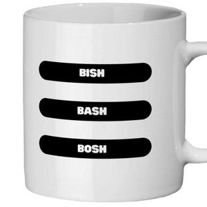 Puede incluir: Una taza de cerámica blanca con un asa negra y el texto "But First, Coffee" en negrita negra. La taza se encuentra sobre un fondo borroso, sugiriendo un ambiente acogedor.