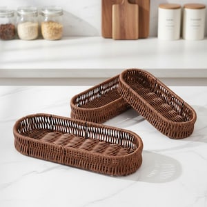 May include: A white ceramic mug with a black handle and the text "But First, Coffee" in a black, bold font. The mug is on a white surface.