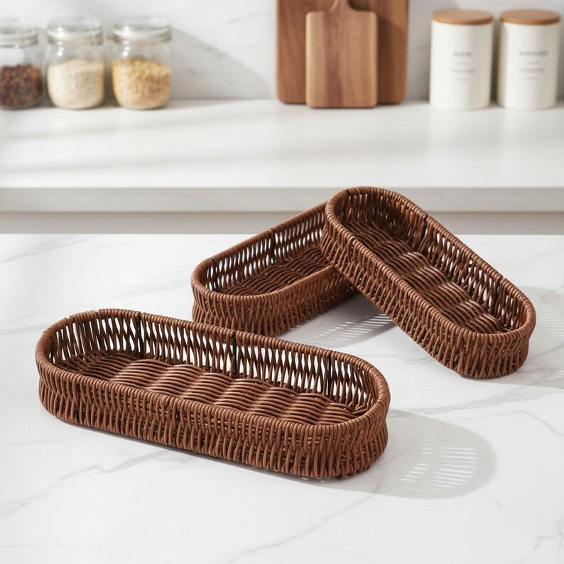 May include: A white ceramic mug with a black handle and the text "But First, Coffee" in a black, bold font. The mug is on a white surface.