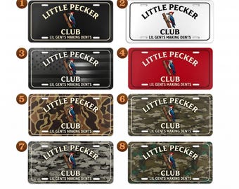 May include: Collection of eight license plates with the text "LITTLE PECKER CLUB" and "LIL GENTS MAKING DENTS". The plates feature various backgrounds, including black, white, red, camouflage, and an American flag design. A woodpecker illustration is also present.