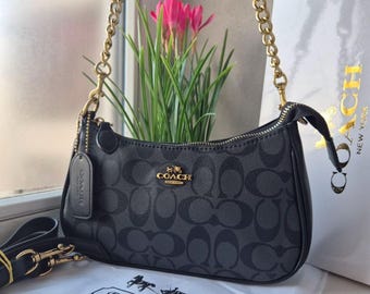 Teri Shoulder Bag — Classic Black Signature Canvas with Gold Accents