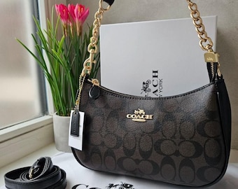 Bolso de hombro Teri — Lona de la firma con detalles en negro y marrón