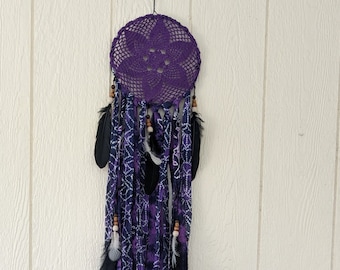 Purple doily wall hanging 9" x 33" with beads and feathers.